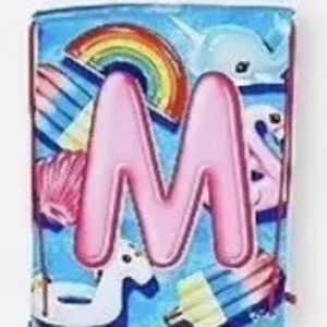 Justice M beach towel in a bag